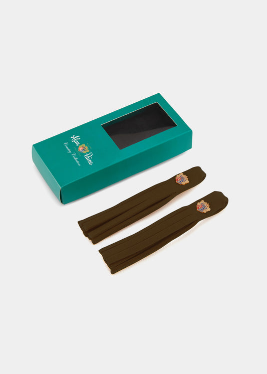 Tofs av filtstövel i brunt