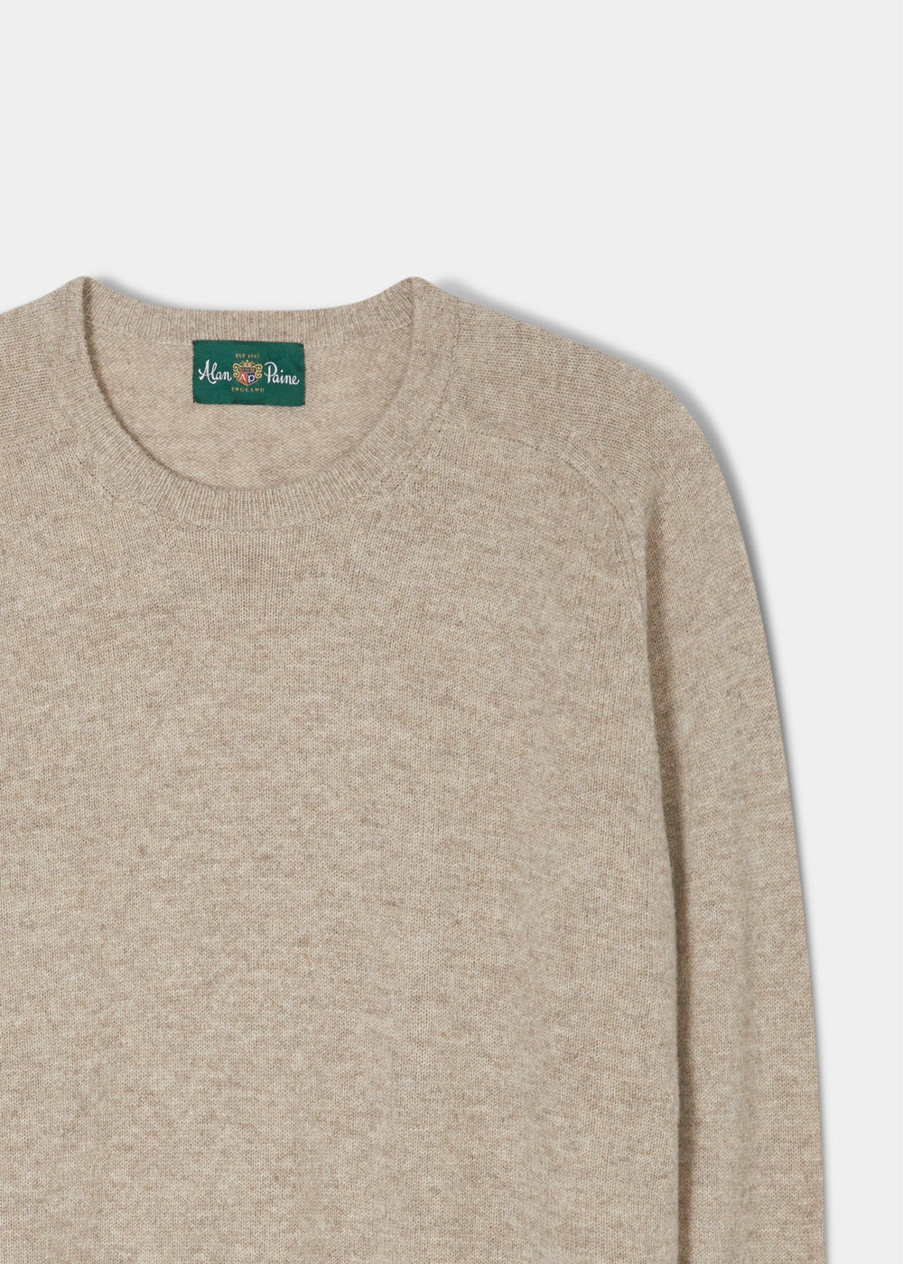 Dorset Lambswool Crew Neck Jumper in Cobble with green collar label, shown on a plain white background.