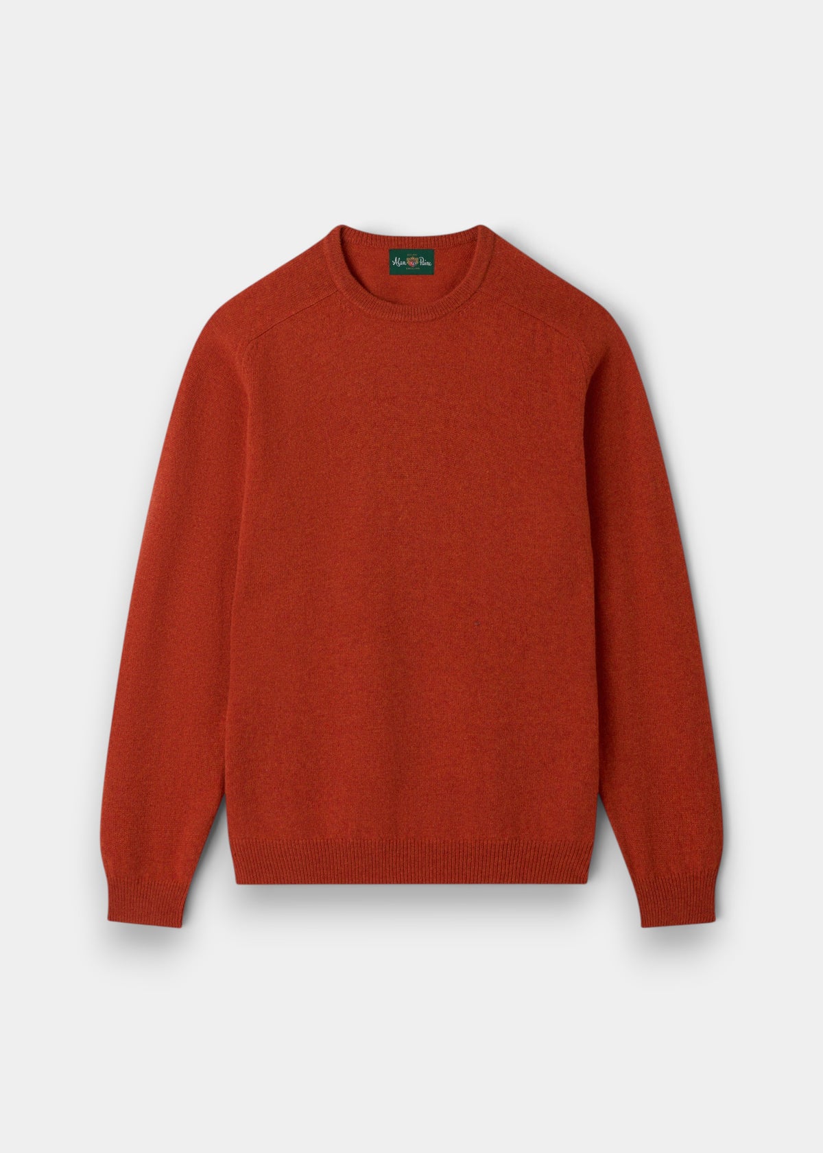 Dorset Lambswool Crew Neck Jumper in Ember: classic fit, long sleeves, ribbed trim, and saddle shoulder design.
