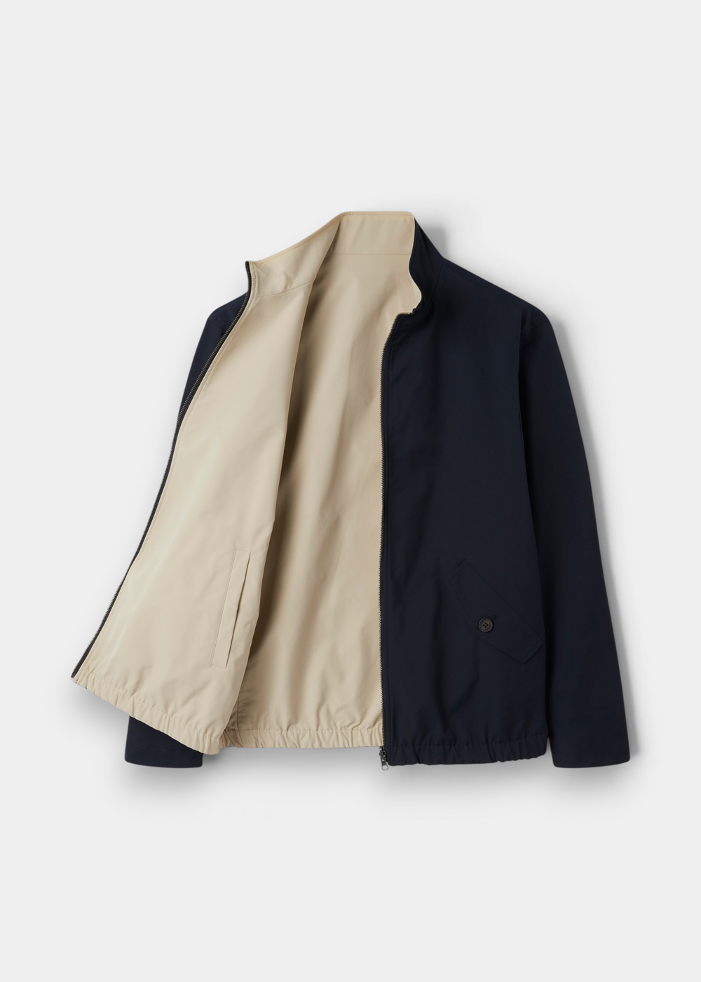 Lakeward Men’s Reversible Bomber Jacket in navy and beige; water-resistant, elastic hem, buttoned pocket.