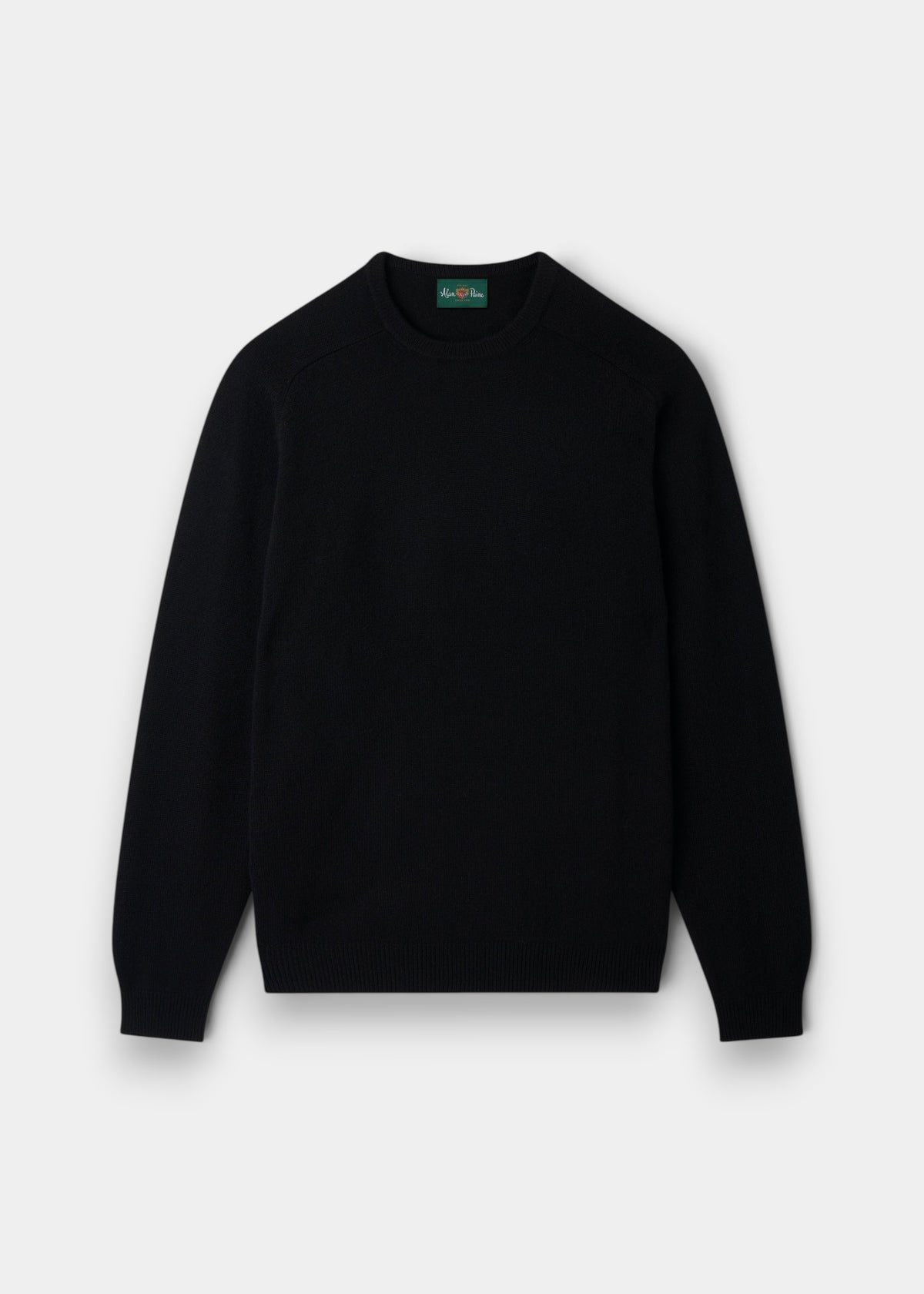 Alan Paine Lenzie men's black crew neck jumper in soft lambswool with saddle shoulder detailing and ribbed cuffs.