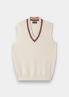 Alan Paine ladies ecru cotton cricket slipover featuring a V-neck with dusk pink and dark navy striped trim.