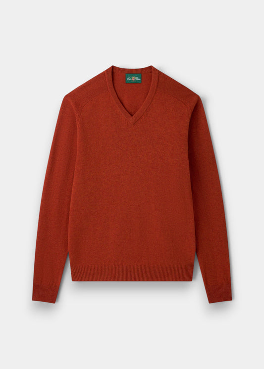 Alan Paine Kilsyth V-neck jumper in ember orange lambswool with ribbed hem and cuffs and saddle shoulder detailing.