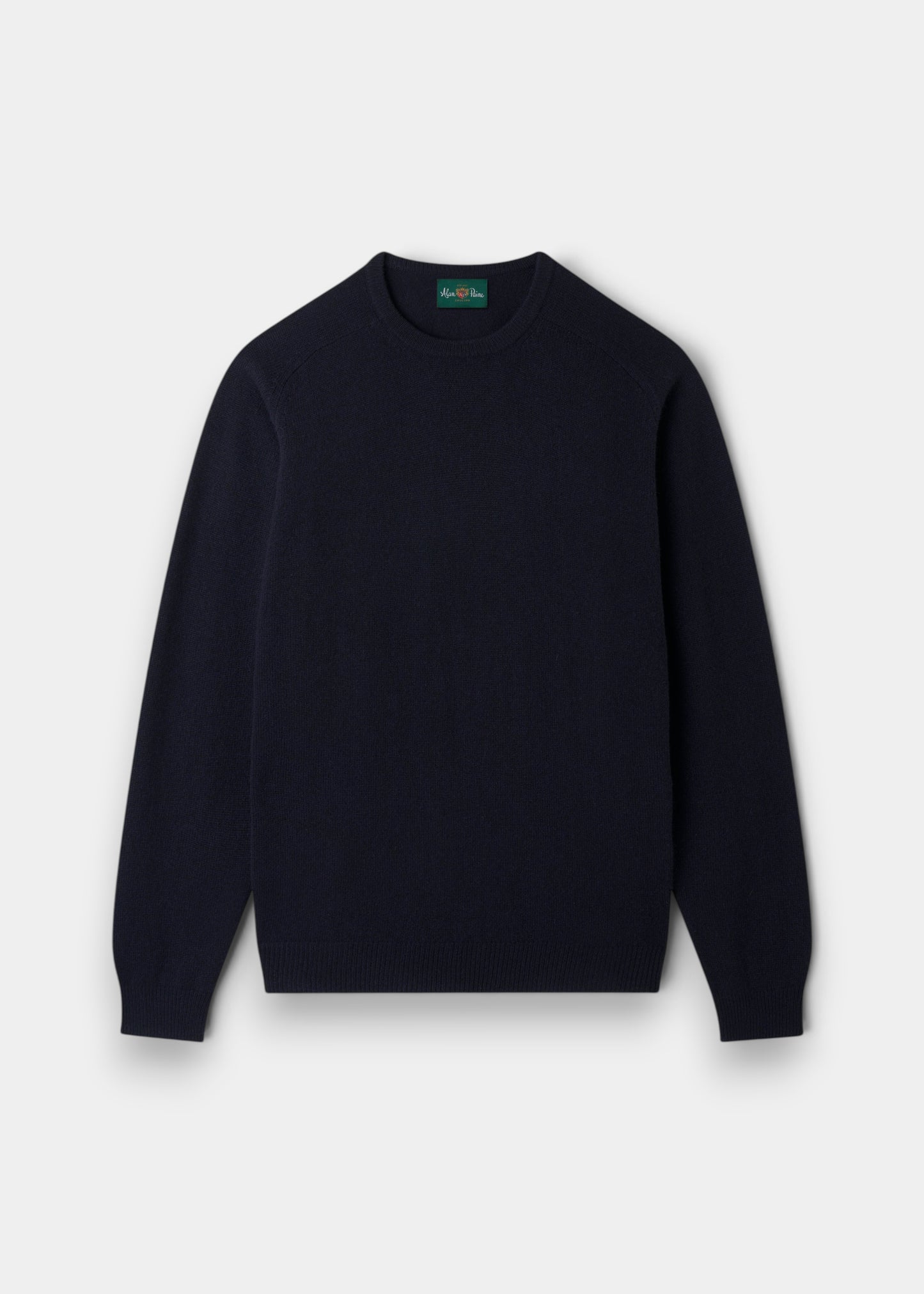 Alan Paine navy crew neck jumper in soft lambswool with a classic fit, saddle shoulders, and ribbed cuffs and hem.