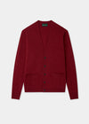 Poppy red cardigan on a light gray background