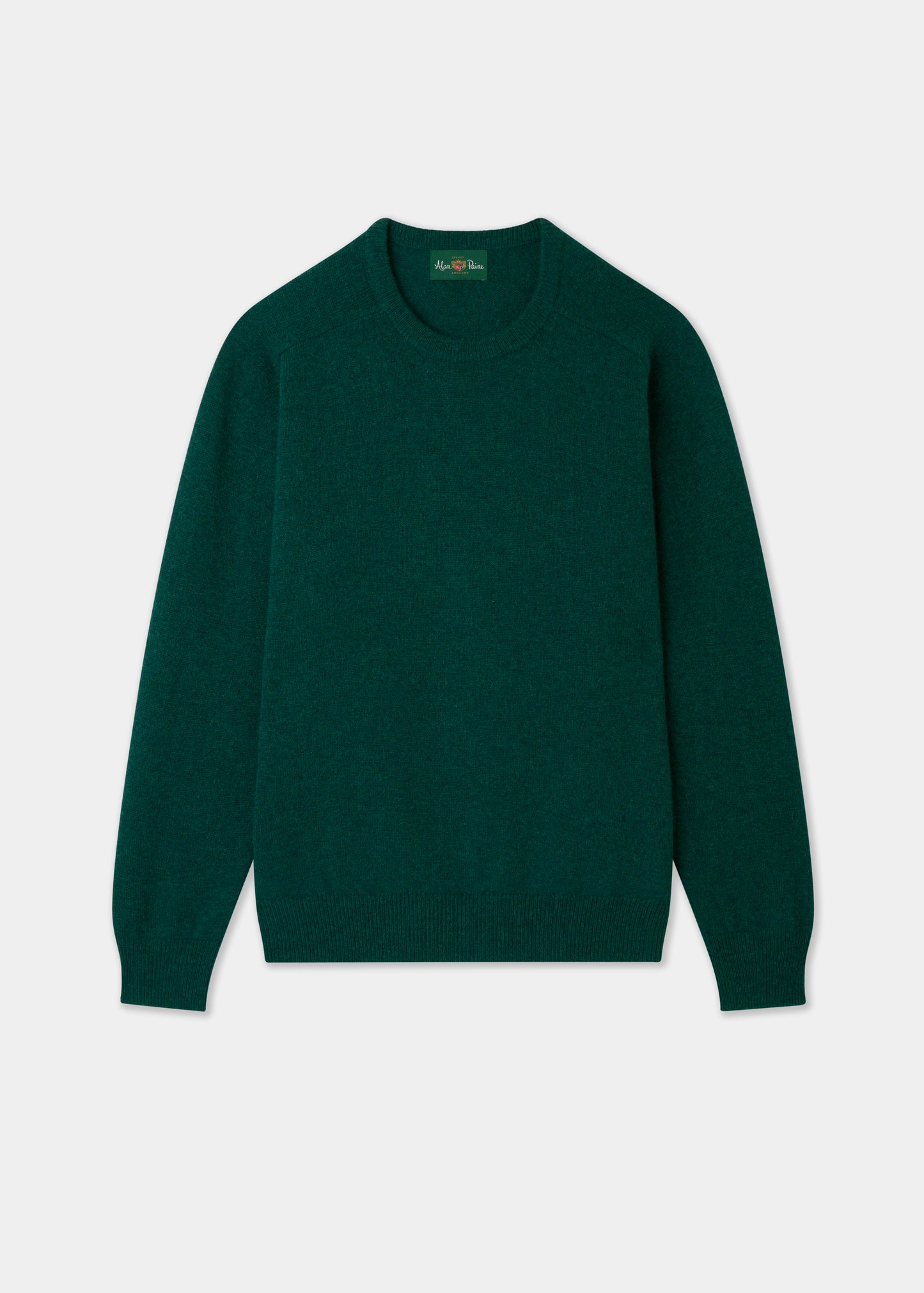 Green sweater on a light gray background