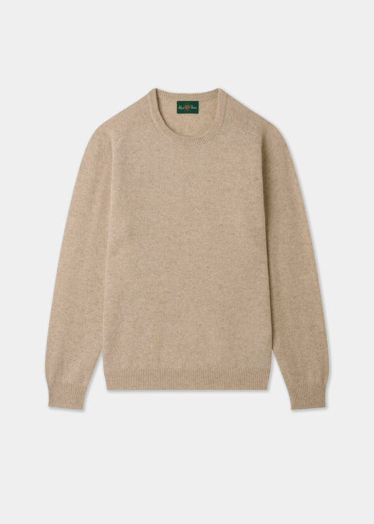 Beige sweater on a light gray background