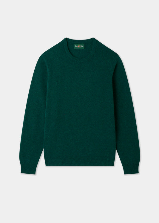 Green sweater on a light gray background