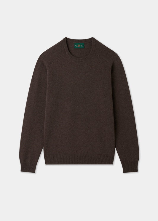 Dark brown sweater on a light gray background